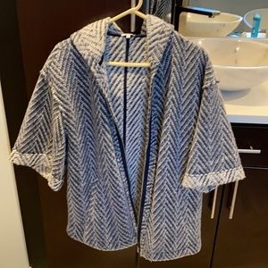 zip up jacket/sweater.  elbow length sleeves